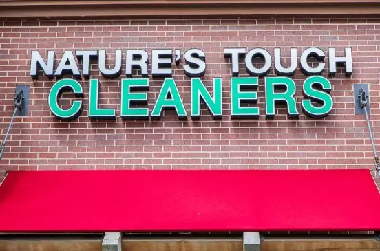 Nature's Touch Cleaners exterior sign at Bluhawk